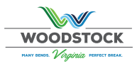 The woodstock logo with a green background